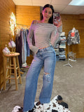 High Rise Medium Wash Distressed Wide Leg Jeans